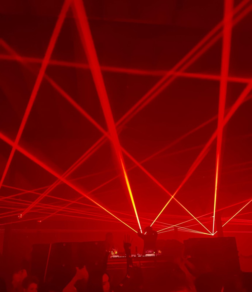 Lasers over a club crowd